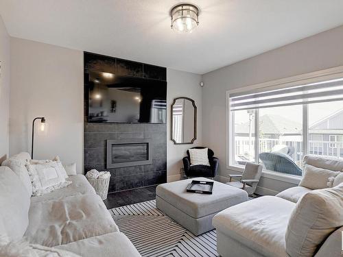 3644 Hummingbird Way, Edmonton, AB - Indoor Photo Showing Living Room With Fireplace