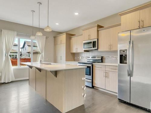 880 Cy Becker Drive, Edmonton, AB - Indoor Photo Showing Kitchen With Upgraded Kitchen