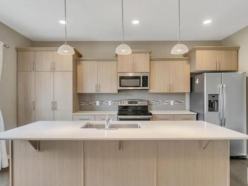 880 Cy Becker Drive, Edmonton, AB - Indoor Photo Showing Kitchen With Upgraded Kitchen