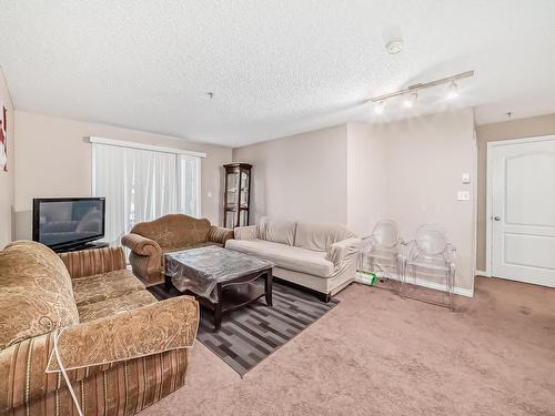 135 3425 19 St, Edmonton, AB - Indoor Photo Showing Living Room