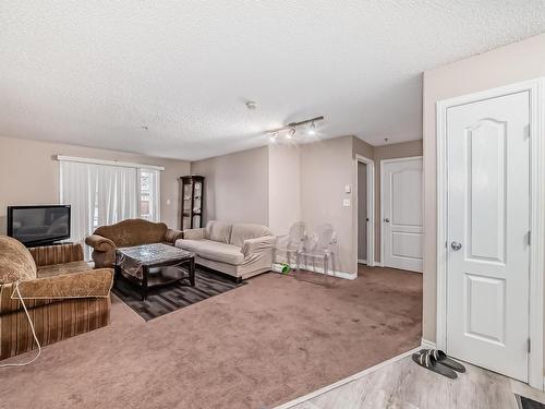 135 3425 19 St, Edmonton, AB - Indoor Photo Showing Living Room