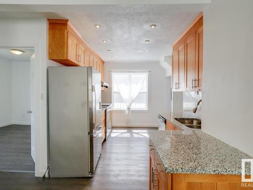 11409 90 Street, Edmonton, AB - Indoor Photo Showing Kitchen With Double Sink