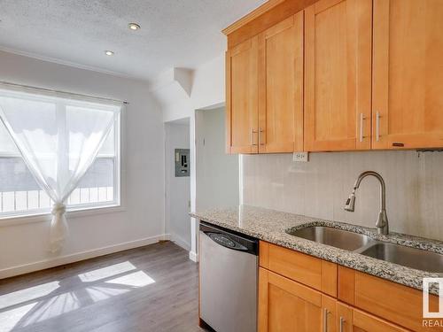 11409 90 Street, Edmonton, AB - Indoor Photo Showing Kitchen With Double Sink