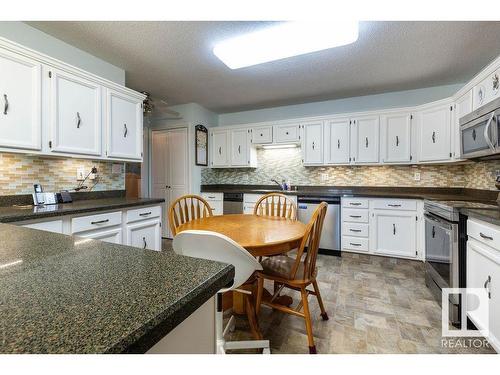 411 14810 51 Avenue, Edmonton, AB - Indoor Photo Showing Kitchen