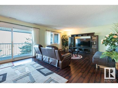 411 14810 51 Avenue, Edmonton, AB - Indoor Photo Showing Living Room