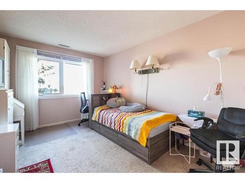 411 14810 51 Avenue, Edmonton, AB - Indoor Photo Showing Bedroom