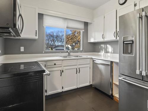 12232 140 Street Nw, Edmonton, AB - Indoor Photo Showing Kitchen With Double Sink