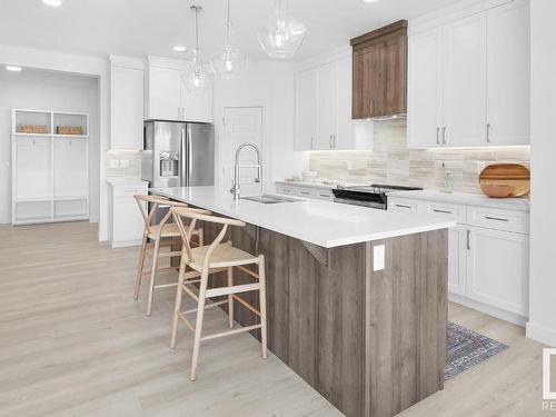 306 Juniper Cove, Leduc, AB - Indoor Photo Showing Kitchen With Upgraded Kitchen