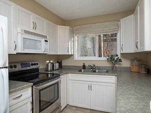 301 10528 77 Avenue, Edmonton, AB - Indoor Photo Showing Kitchen With Double Sink