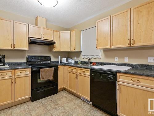 114 178 Bridgeport Boulevard, Leduc, AB - Indoor Photo Showing Kitchen With Double Sink