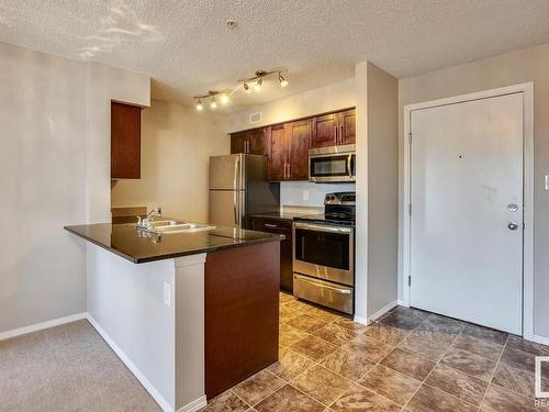 Edmonton, AB - Indoor Photo Showing Kitchen With Double Sink