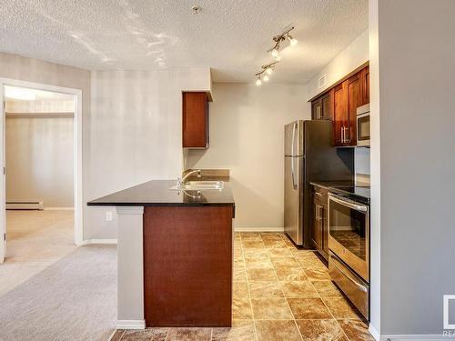 Edmonton, AB - Indoor Photo Showing Kitchen