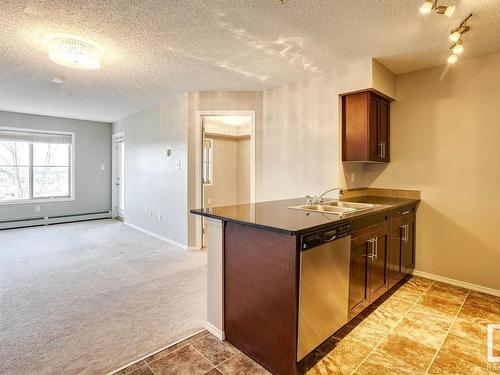 Edmonton, AB - Indoor Photo Showing Kitchen With Double Sink