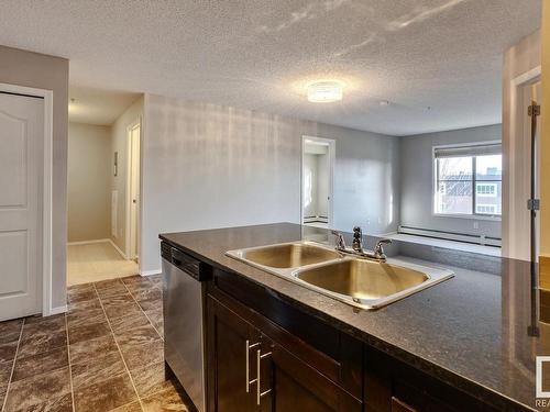 Edmonton, AB - Indoor Photo Showing Kitchen With Double Sink