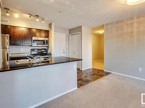 Edmonton, AB - Indoor Photo Showing Kitchen With Double Sink