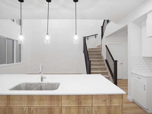 26 Enns Court, Fort Saskatchewan, AB - Indoor Photo Showing Kitchen With Double Sink