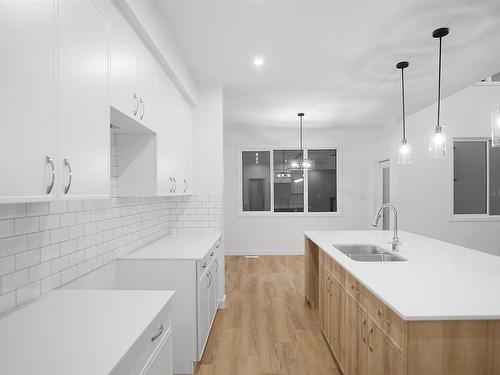 26 Enns Court, Fort Saskatchewan, AB - Indoor Photo Showing Kitchen With Double Sink With Upgraded Kitchen