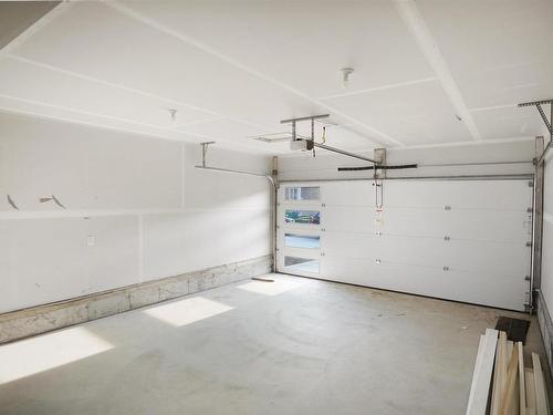 57 Elliott Wynd, Fort Saskatchewan, AB - Indoor Photo Showing Garage