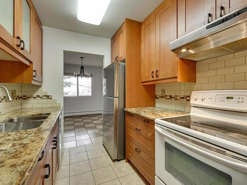 308 14825 51 Avenue, Edmonton, AB - Indoor Photo Showing Kitchen With Double Sink