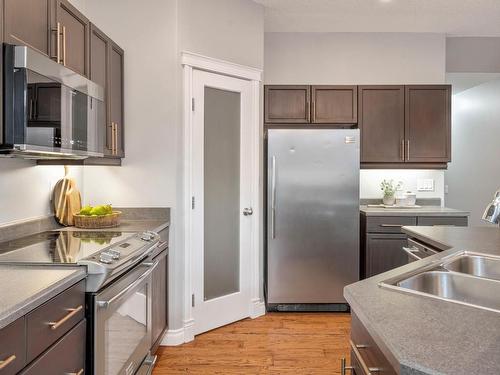 124 Keyport Circle, Leduc, AB - Indoor Photo Showing Kitchen With Double Sink