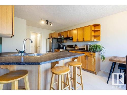 9806 179 Avenue, Edmonton, AB - Indoor Photo Showing Kitchen With Double Sink