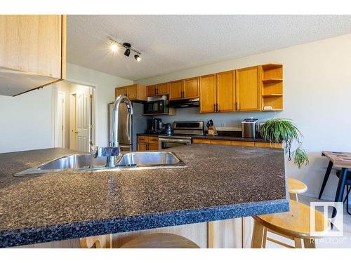 9806 179 Avenue, Edmonton, AB - Indoor Photo Showing Kitchen With Double Sink