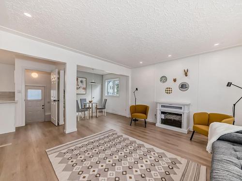 9819 149 Street, Edmonton, AB - Indoor Photo Showing Living Room With Fireplace