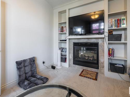 5052 Mcluhan Road, Edmonton, AB - Indoor Photo Showing Living Room With Fireplace