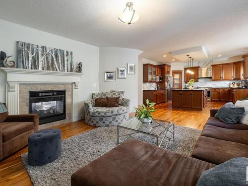 5052 Mcluhan Road, Edmonton, AB - Indoor Photo Showing Living Room With Fireplace