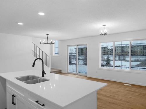 17243 9B Avenue, Edmonton, AB - Indoor Photo Showing Kitchen With Double Sink