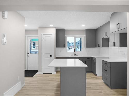 4 525 Secord Boulevard, Edmonton, AB - Indoor Photo Showing Kitchen With Upgraded Kitchen