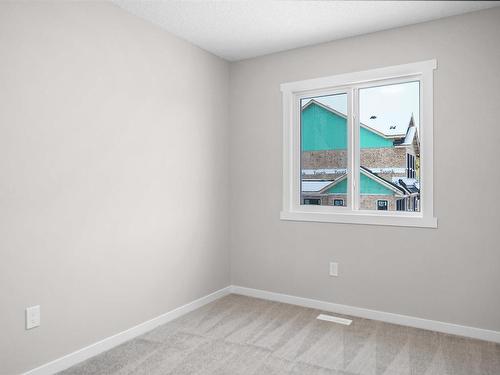 4 525 Secord Boulevard, Edmonton, AB - Indoor Photo Showing Other Room