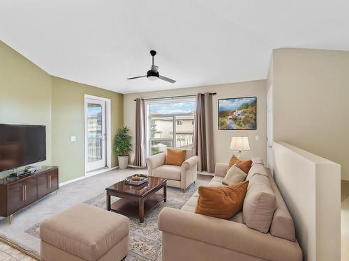 60 150 Edwards Drive, Edmonton, AB - Indoor Photo Showing Living Room