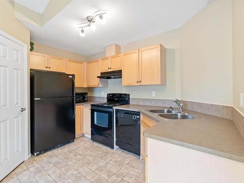 60 150 Edwards Drive, Edmonton, AB - Indoor Photo Showing Kitchen With Double Sink