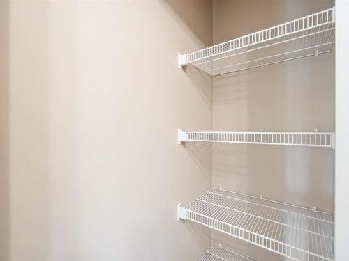 60 150 Edwards Drive, Edmonton, AB - Indoor With Storage