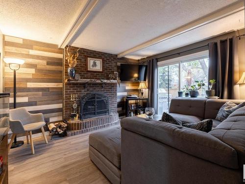 7028 187 Street, Edmonton, AB - Indoor Photo Showing Living Room With Fireplace