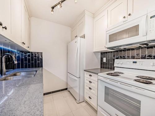 607 10045 117 Street Nw, Edmonton, AB - Indoor Photo Showing Kitchen With Double Sink