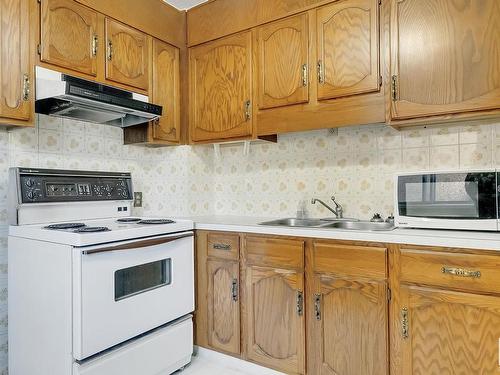 11329 94 Street, Edmonton, AB - Indoor Photo Showing Kitchen With Double Sink