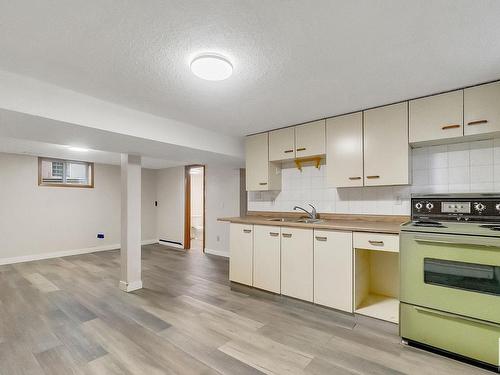 11329 94 Street, Edmonton, AB - Indoor Photo Showing Kitchen With Double Sink