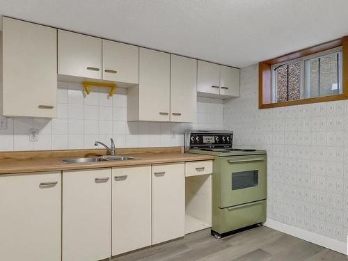 11329 94 Street, Edmonton, AB - Indoor Photo Showing Kitchen With Double Sink