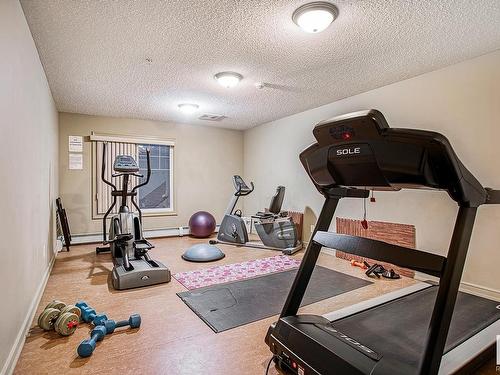 213 13710 150 Avenue, Edmonton, AB - Indoor Photo Showing Gym Room