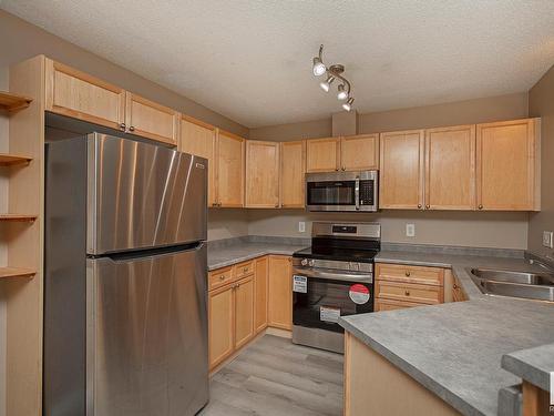 213 13710 150 Avenue, Edmonton, AB - Indoor Photo Showing Kitchen With Double Sink