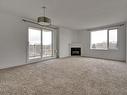 505 10649 Saskatchewan Drive, Edmonton, AB  - Indoor Photo Showing Living Room With Fireplace 