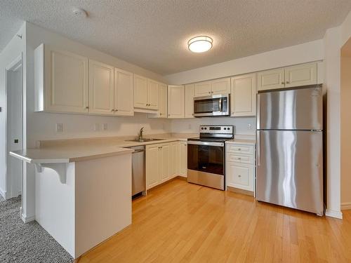 505 10649 Saskatchewan Drive, Edmonton, AB - Indoor Photo Showing Kitchen With Double Sink