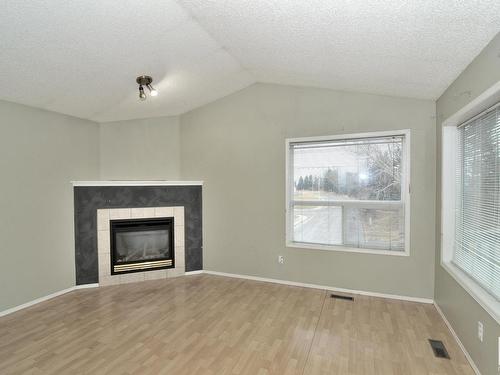 12707 136 Street, Edmonton, AB - Indoor Photo Showing Living Room With Fireplace