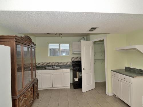 12707 136 Street, Edmonton, AB - Indoor Photo Showing Kitchen With Double Sink