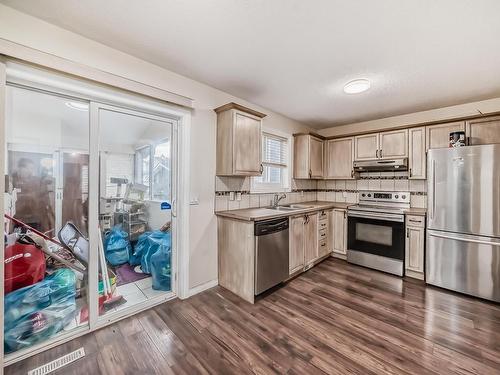 56 Martin Crossing Crescent Ne, Calgary, AB - Indoor Photo Showing Kitchen With Double Sink