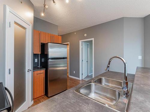 402 10504 99 Avenue, Edmonton, AB - Indoor Photo Showing Kitchen With Stainless Steel Kitchen With Double Sink