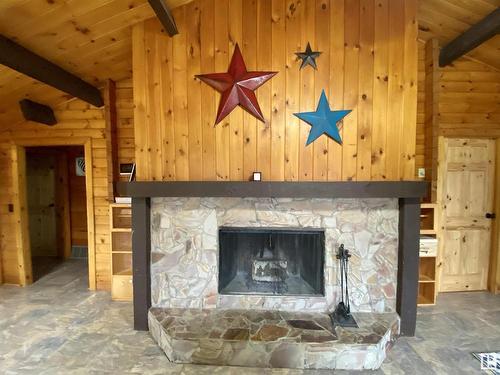 21344 Sec Hwy 617, Rural Camrose County, AB - Indoor Photo Showing Living Room With Fireplace