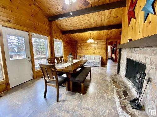 21344 Sec Hwy 617, Rural Camrose County, AB - Indoor Photo Showing Dining Room With Fireplace